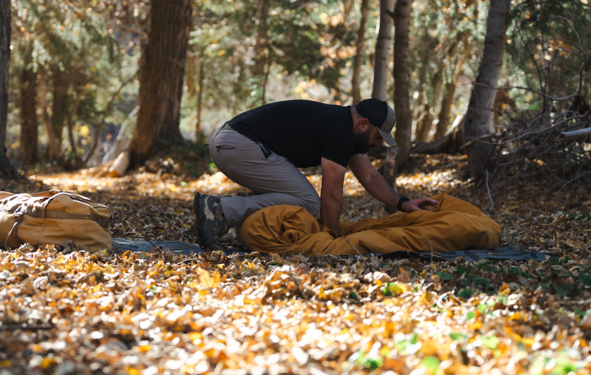 Modern outdoor bedroll set up at a hunting camp