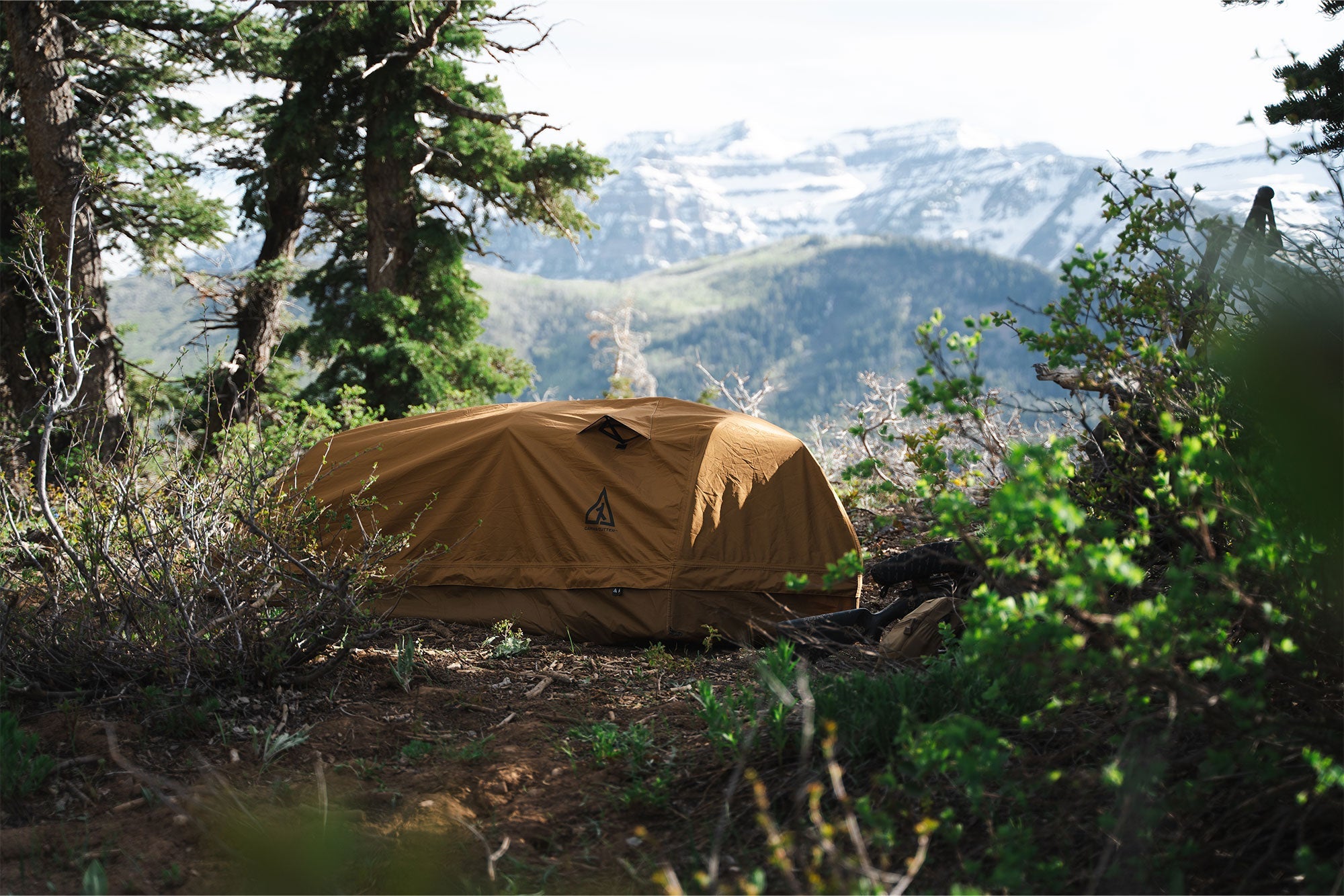 Summit bivy shelter set up in a minimalist backcountry camp