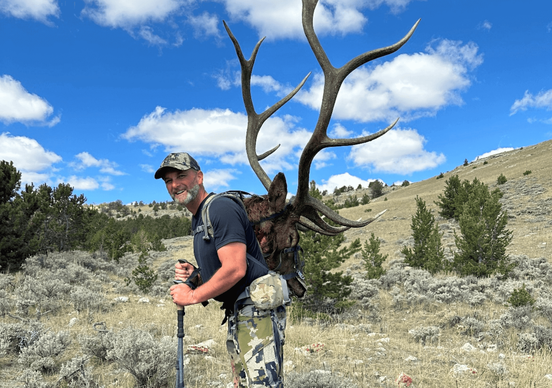 hunter using mapping software and notes to plan multi-state hunting applications