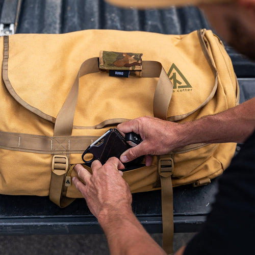 Burro duffel exterior pocket showing waterproof canvas and buckle system