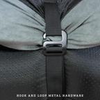 camping foam sleeping pad rolled up and secured with compression straps