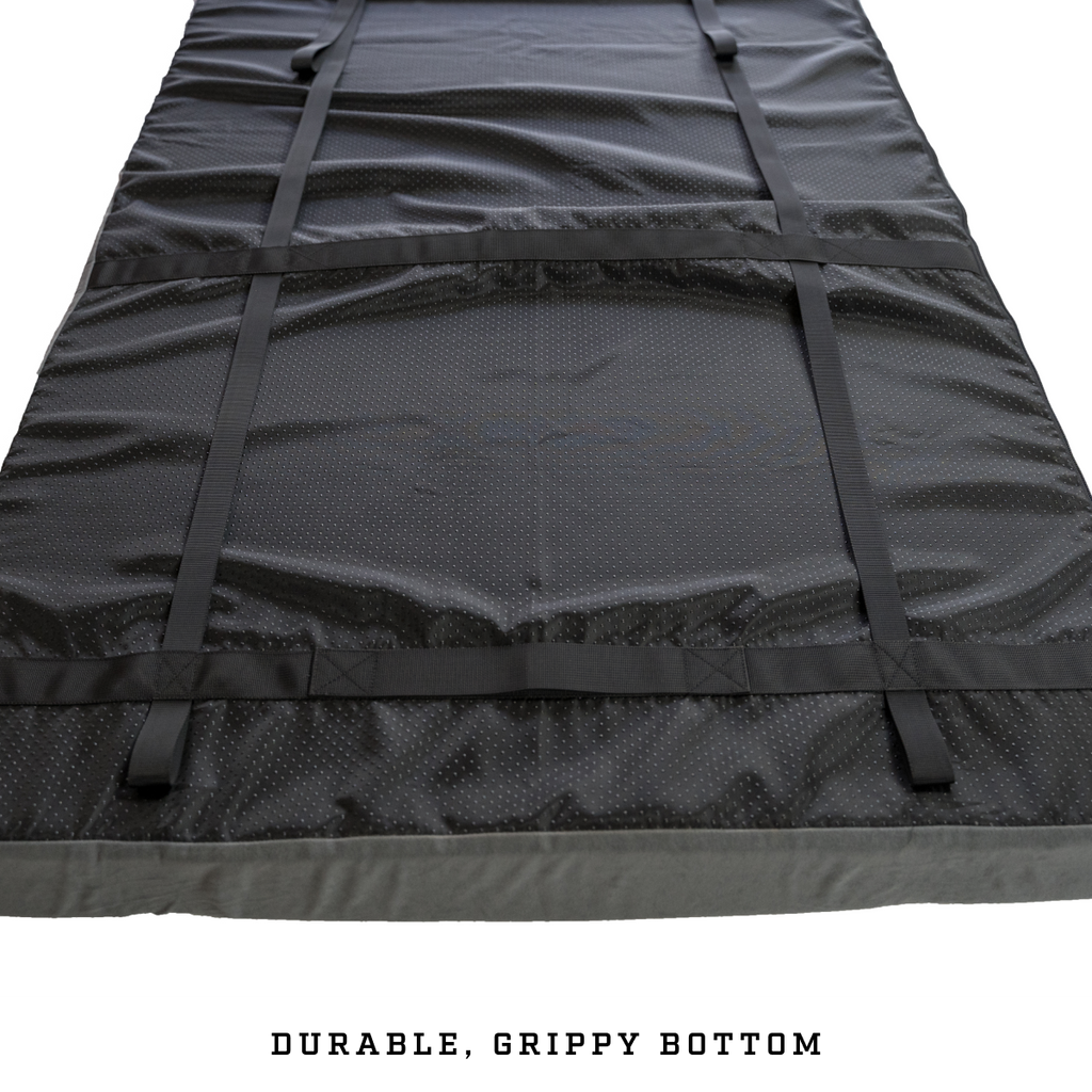 camping sleep pad showing durable Oxford bottom with grip points to prevent sliding
