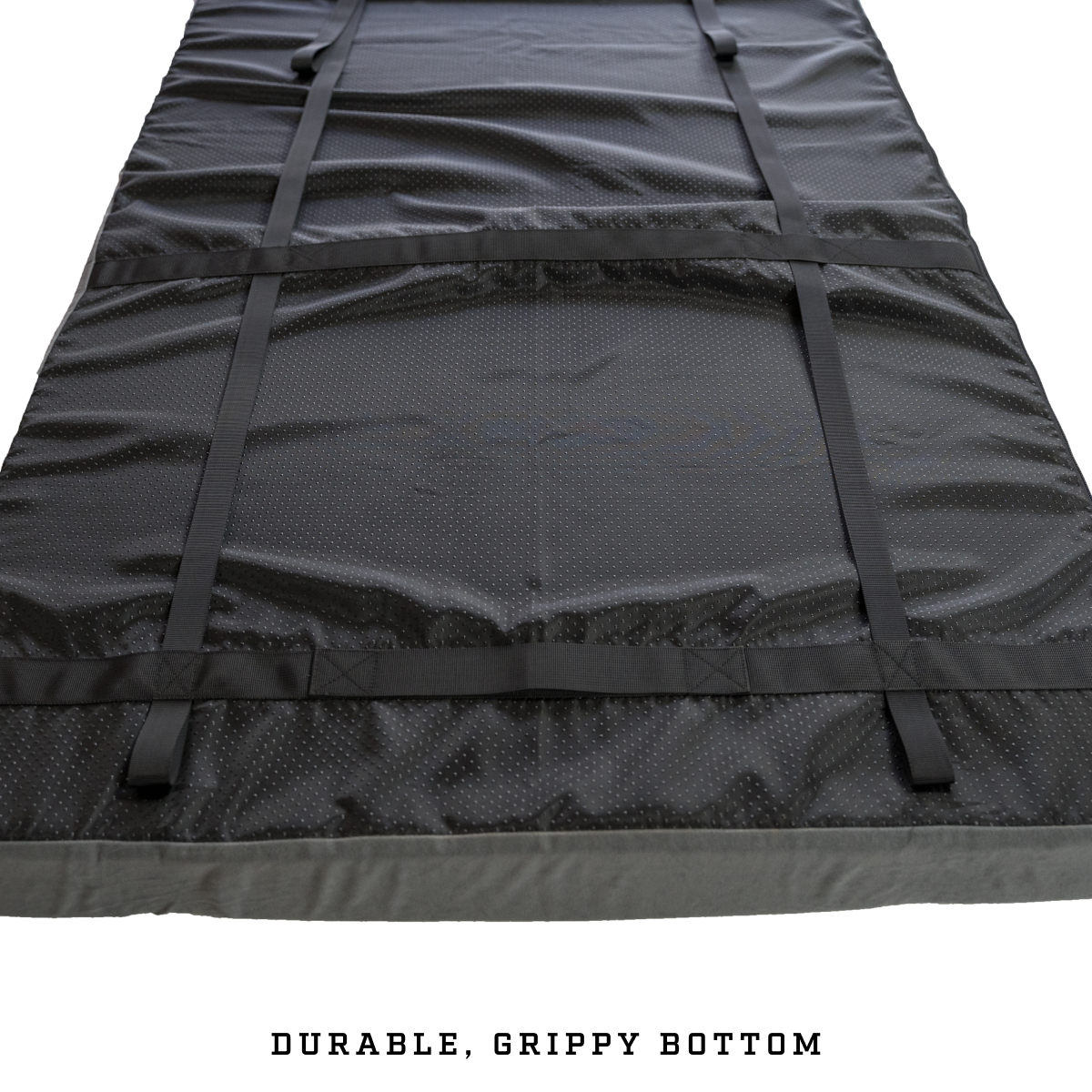 camping sleep pad showing durable Oxford bottom with grip points to prevent sliding