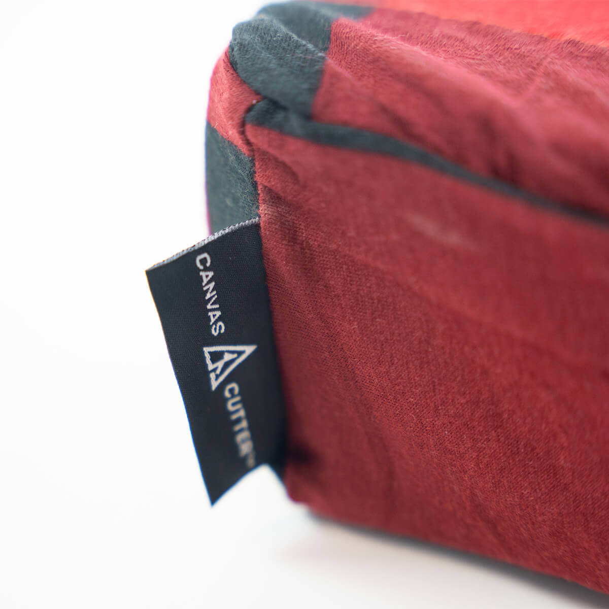 Close up of stitching and fabric detail on the Buffalo Plaid Foam Cover