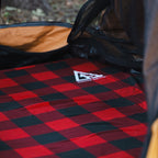 Buffalo Plaid Foam Cover over pad inside a bedroll