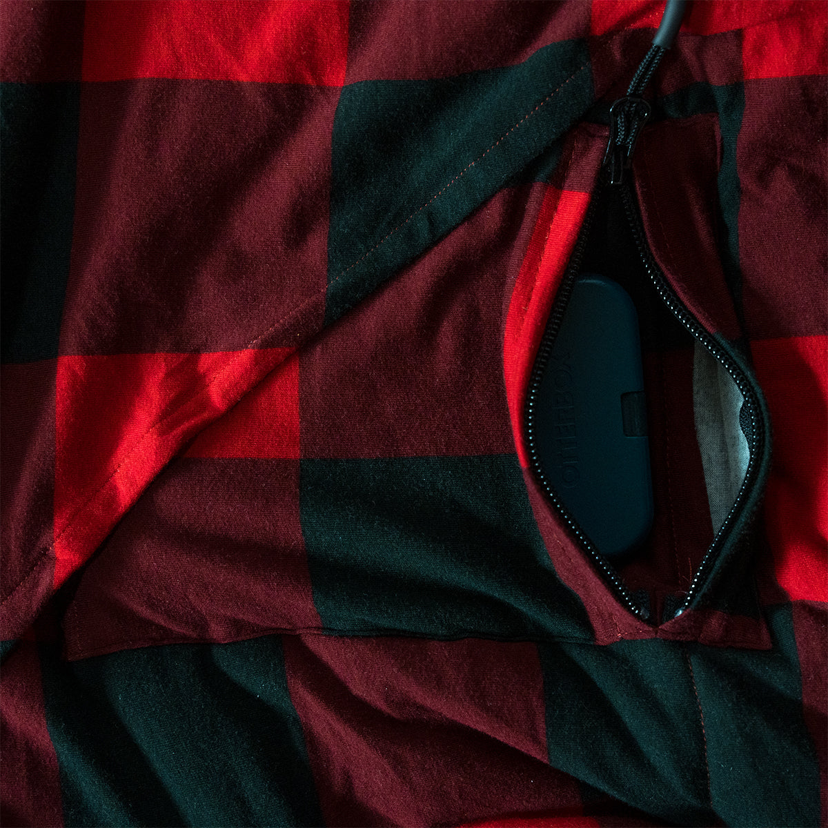 Interior pocket inside the Bunker Bag with cord escape for storing small items