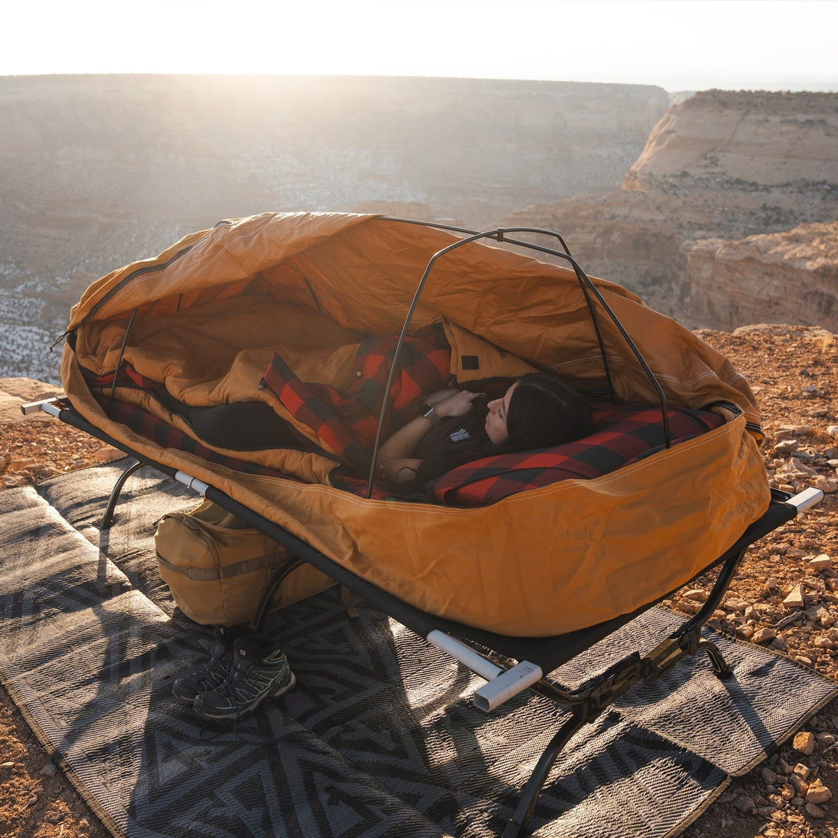 Canvas Cutter Bunker Bag paired with a Dominator Bedroll on a cot for elevated sleeping