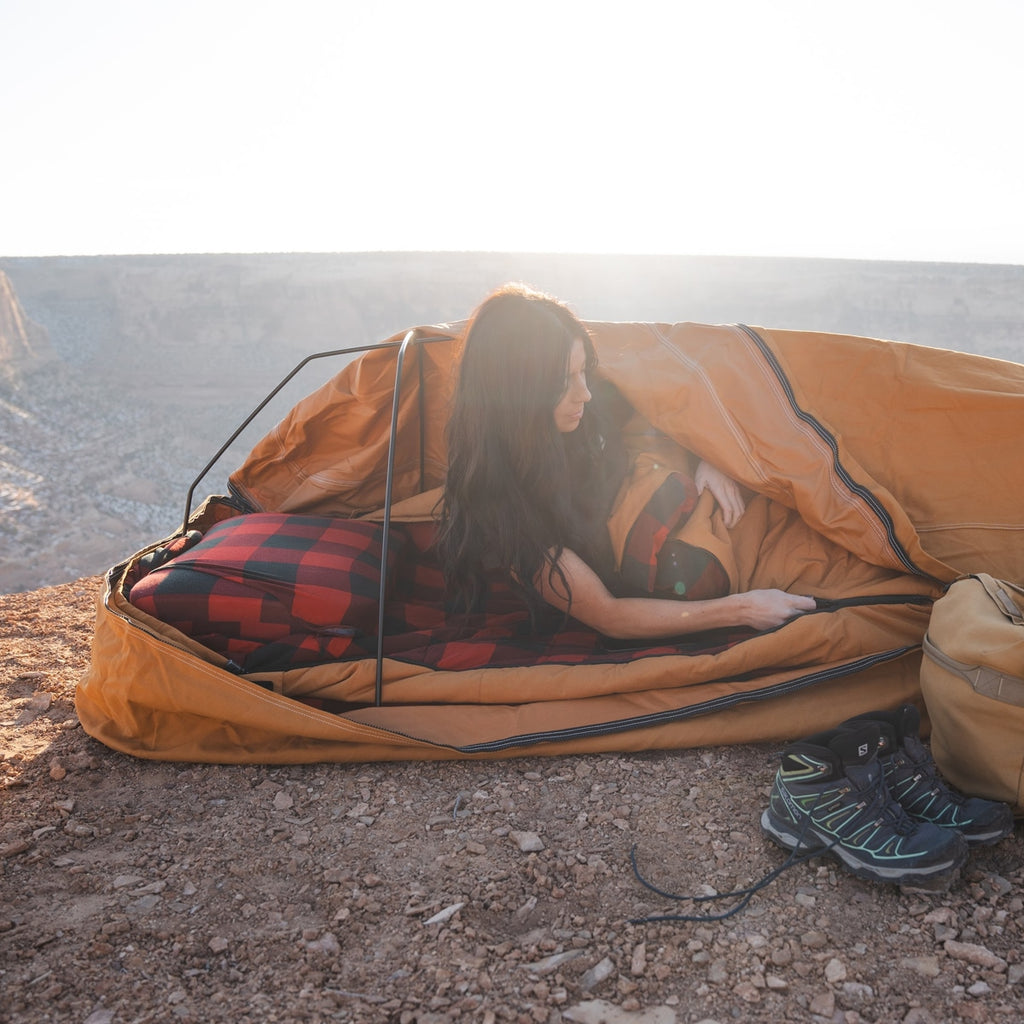 Canvas Cutter Bunker Bag opened in use outdoors showing interior space and cold weather comfort inn 0 degree weather