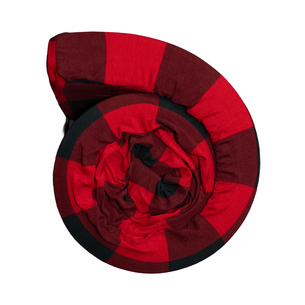 Canvas Cutter bedroll foam pad rolled up, showing a premium mattress foam upgrade for added comfort while camping