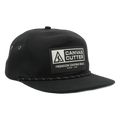 Front view of the Canvas Cutter Casual Friday Hat featuring a flat brim snapback design with branded patch