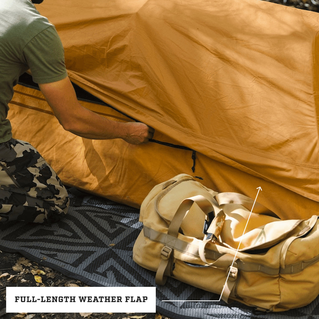 Full length canvas weather flaps on the Dominator 3.0 bedroll protecting against wind, rain, dust, and debris