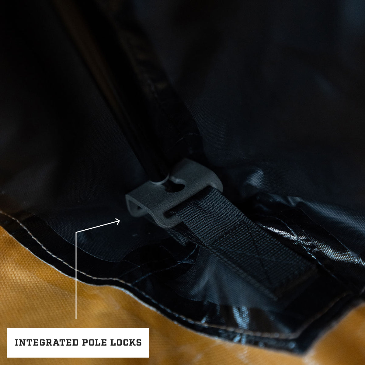 Integrated pole locking system on the Dominator 3.0 bedroll providing stability and structure on uneven ground