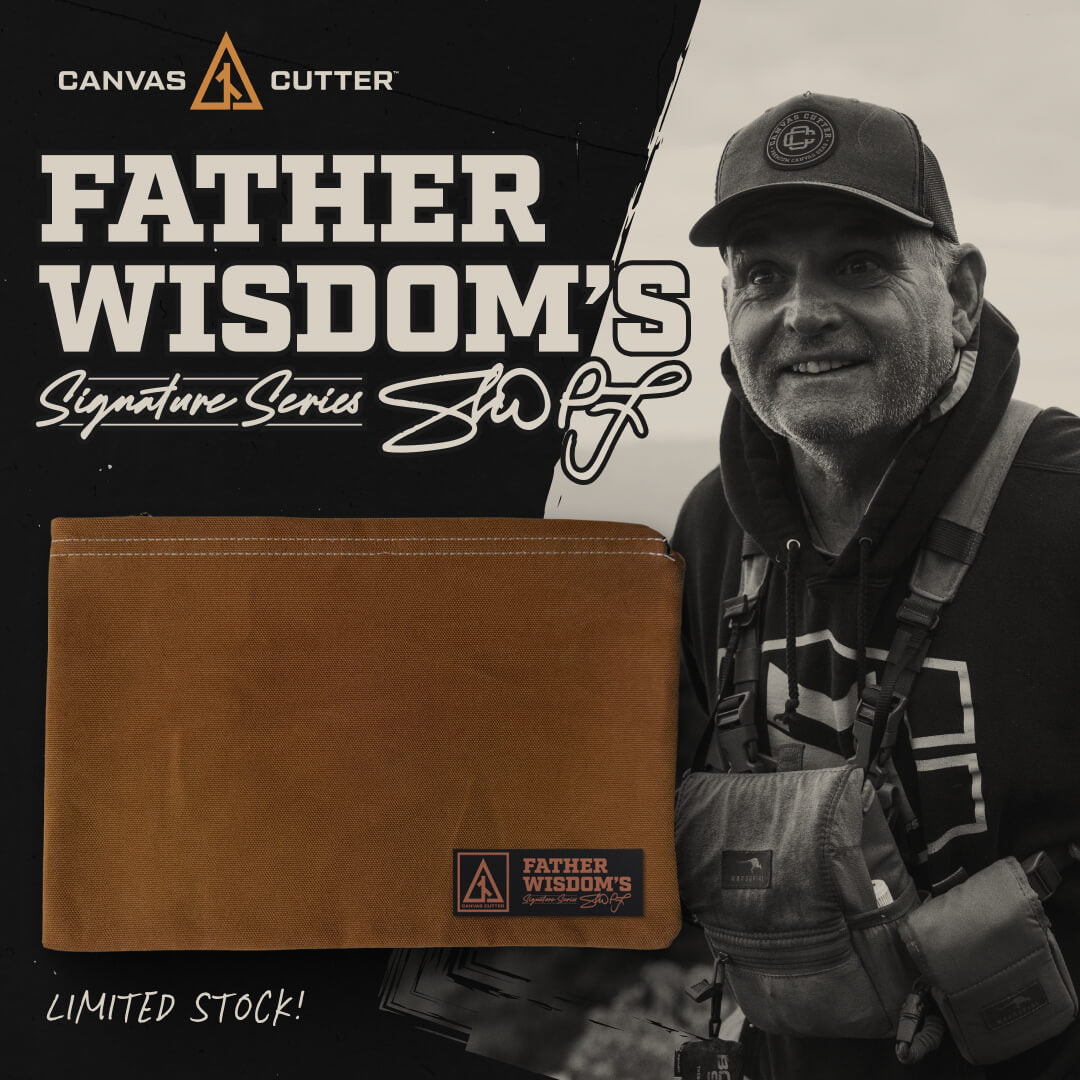 Father Wisdom Signature Series Utility Bag showing the product name on the front of the handcrafted canvas bag