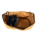 Interior view of The Locker showing storage space for boots and personal gear