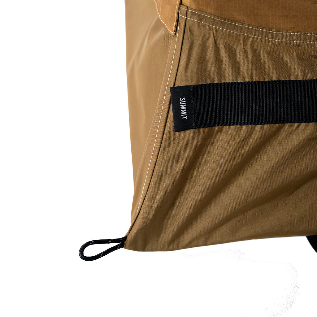 Corner tie out and strap detail on the Summit Sleep System showing lightweight attachment points. D-Loop